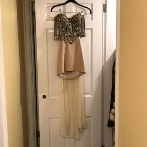 Asymmetrical mini dress with long tail in back